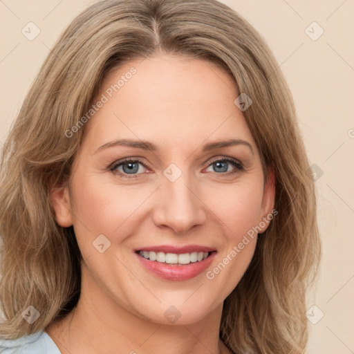 Joyful white young-adult female with medium  brown hair and green eyes