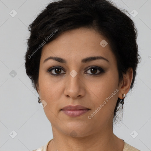 Joyful latino young-adult female with short  brown hair and brown eyes