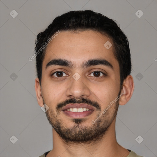 Joyful latino young-adult male with short  black hair and brown eyes