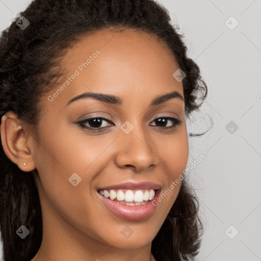 Joyful latino young-adult female with long  brown hair and brown eyes