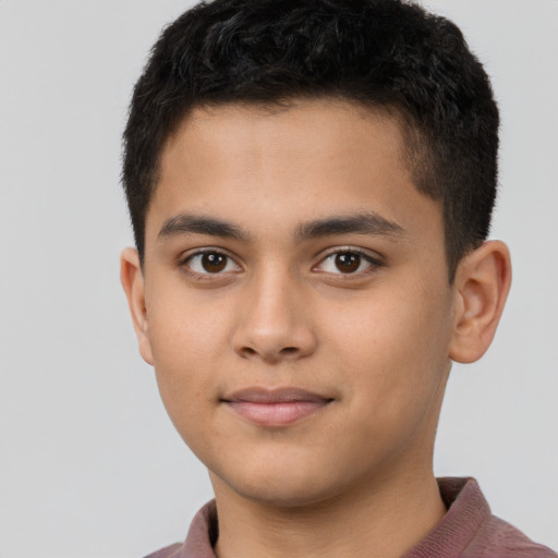 Joyful latino young-adult male with short  brown hair and brown eyes