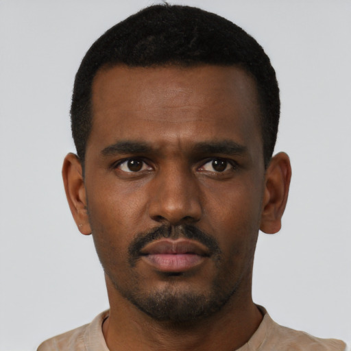 Neutral black young-adult male with short  black hair and brown eyes