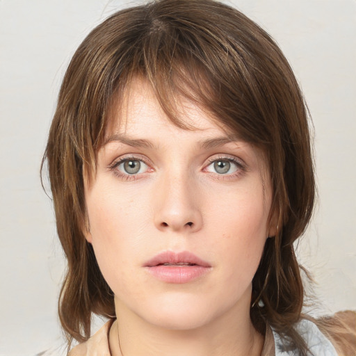 Neutral white young-adult female with medium  brown hair and grey eyes