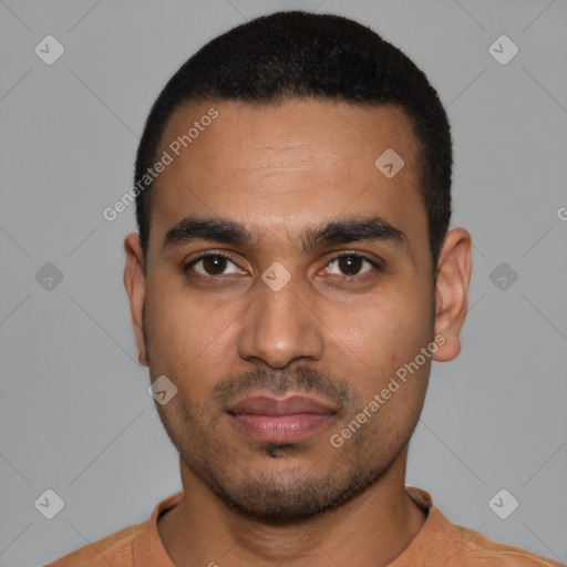 Neutral latino young-adult male with short  black hair and brown eyes