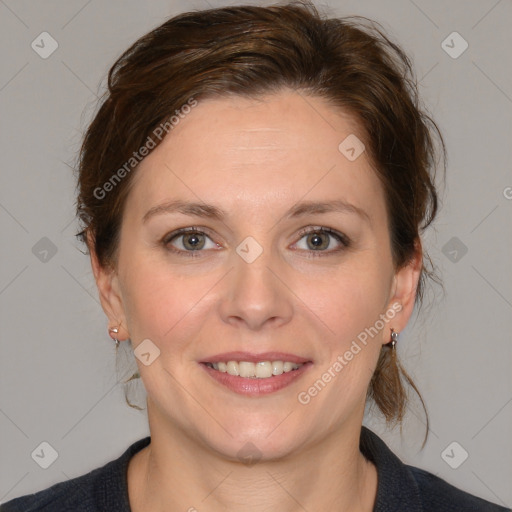 Joyful white young-adult female with medium  brown hair and blue eyes