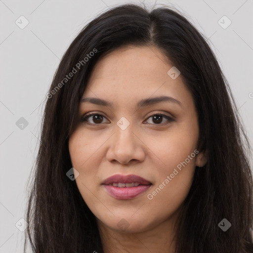 Joyful latino young-adult female with long  brown hair and brown eyes