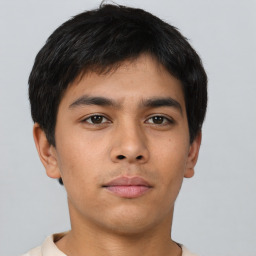 Neutral asian young-adult male with short  brown hair and brown eyes