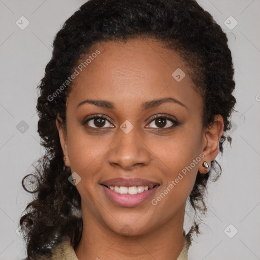 Joyful black young-adult female with medium  brown hair and brown eyes