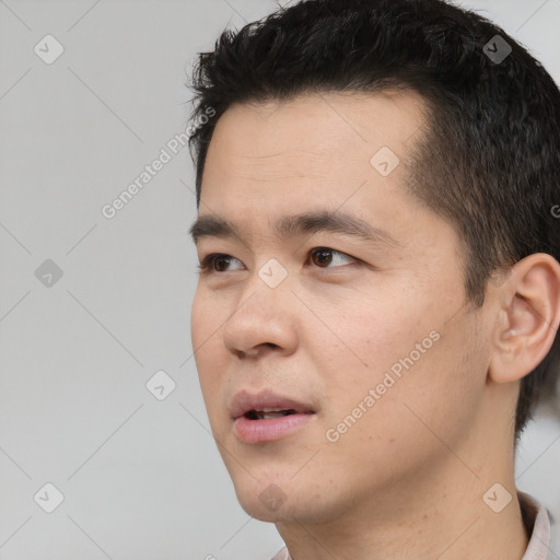 Neutral asian young-adult male with short  black hair and brown eyes