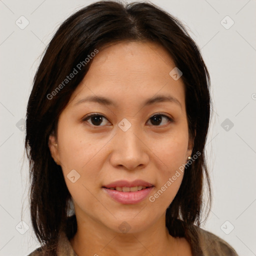 Joyful asian young-adult female with medium  brown hair and brown eyes