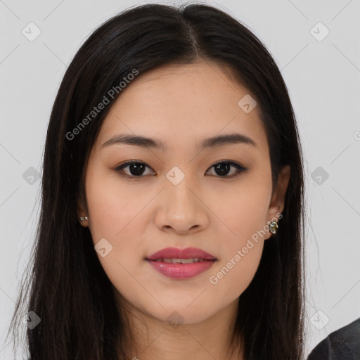 Joyful asian young-adult female with long  brown hair and brown eyes