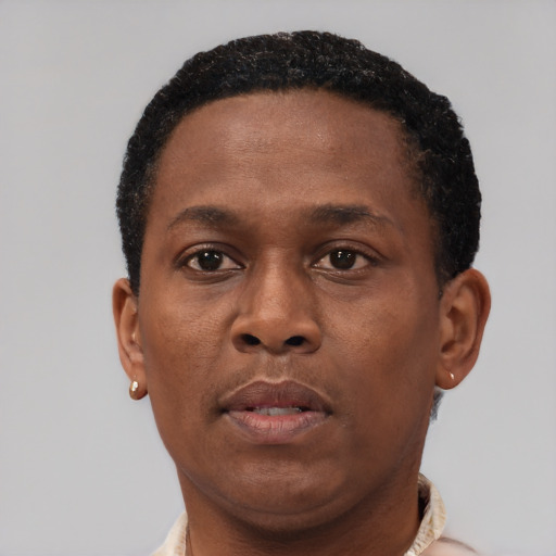 Neutral black young-adult male with short  brown hair and brown eyes