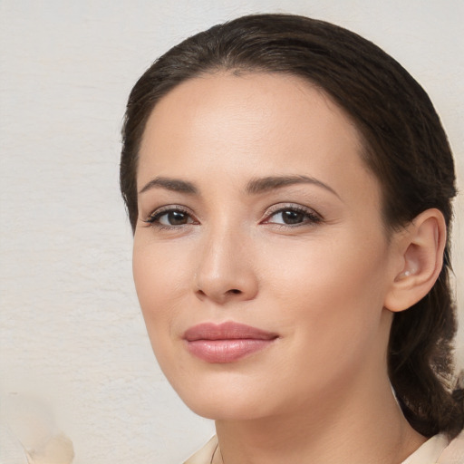 Joyful white young-adult female with medium  brown hair and brown eyes