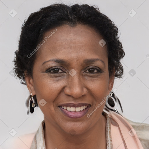 Joyful latino adult female with medium  brown hair and brown eyes