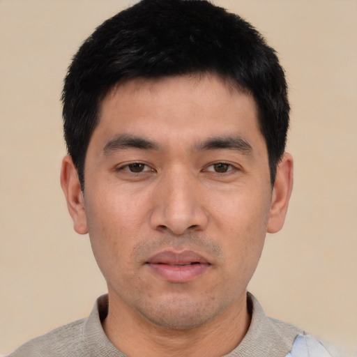 Neutral asian young-adult male with short  black hair and brown eyes
