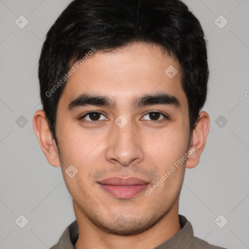 Joyful asian young-adult male with short  brown hair and brown eyes