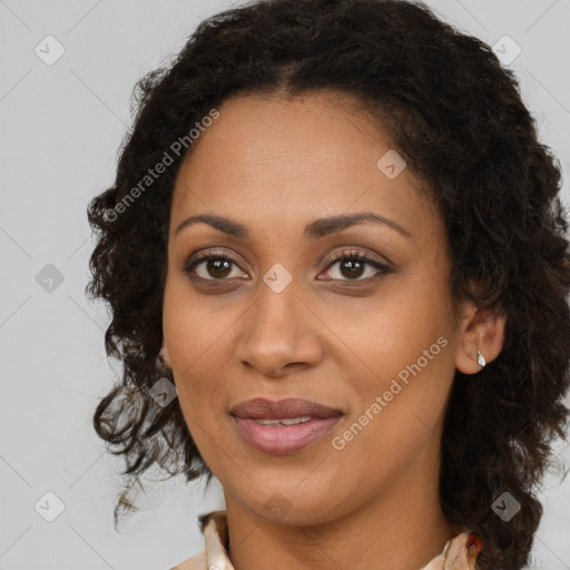 Joyful black young-adult female with medium  brown hair and brown eyes