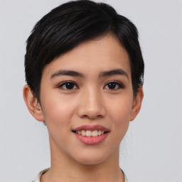 Joyful asian young-adult female with short  brown hair and brown eyes