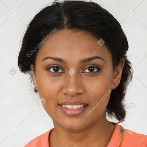 Joyful black young-adult female with medium  brown hair and brown eyes