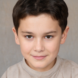 Joyful white child male with short  brown hair and brown eyes