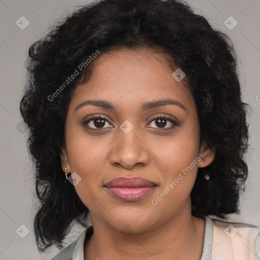 Joyful black young-adult female with long  brown hair and brown eyes