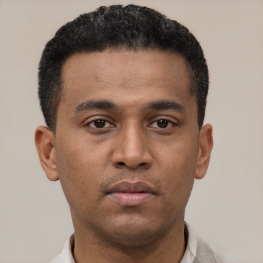 Neutral latino young-adult male with short  black hair and brown eyes