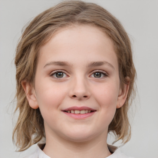 Joyful white child female with medium  brown hair and grey eyes