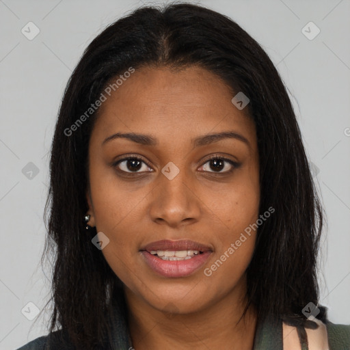 Joyful black young-adult female with long  brown hair and brown eyes