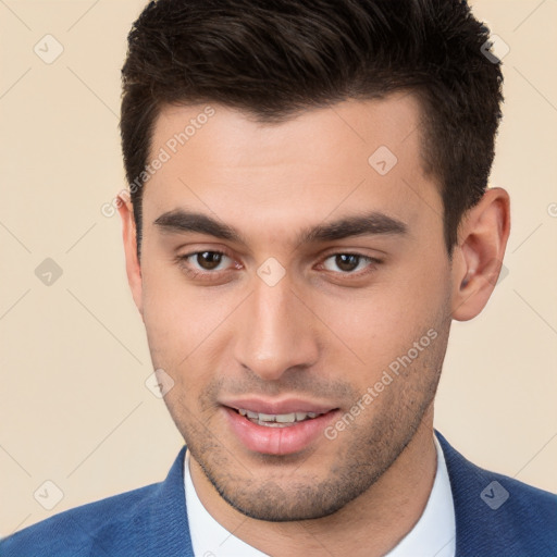 Joyful white young-adult male with short  brown hair and brown eyes