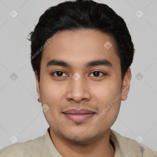 Joyful latino young-adult male with short  black hair and brown eyes