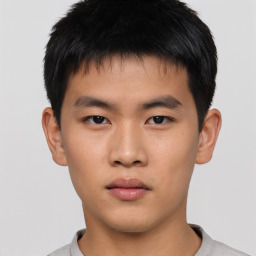 Neutral asian young-adult male with short  brown hair and brown eyes