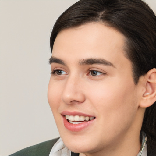 Joyful white young-adult male with medium  brown hair and brown eyes