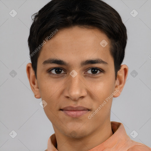 Joyful latino young-adult male with short  brown hair and brown eyes