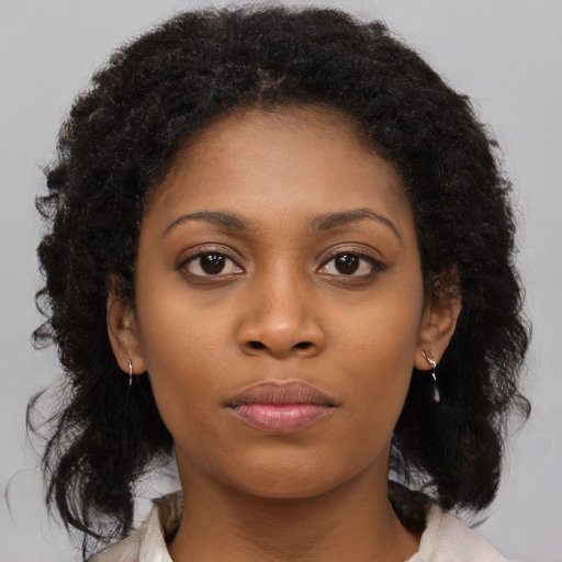 Neutral black young-adult female with long  black hair and brown eyes
