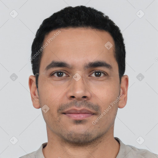 Neutral latino young-adult male with short  black hair and brown eyes