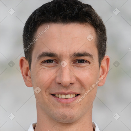 Joyful white young-adult male with short  brown hair and brown eyes