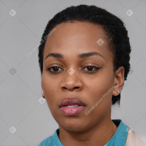 Neutral black young-adult female with short  black hair and brown eyes