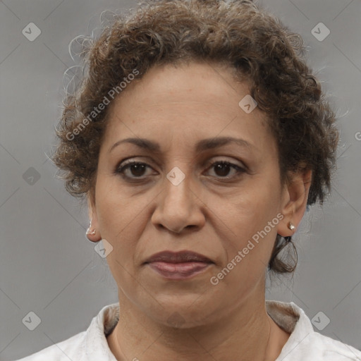 Joyful white adult female with short  brown hair and brown eyes