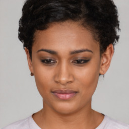 Neutral black young-adult female with short  brown hair and brown eyes