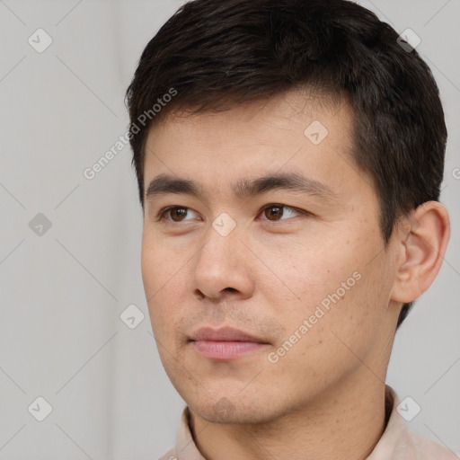 Neutral white young-adult male with short  black hair and brown eyes