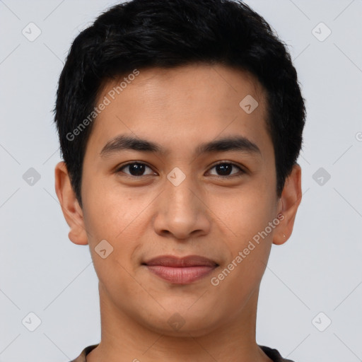 Joyful asian young-adult male with short  black hair and brown eyes