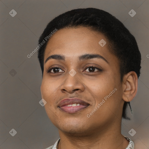 Joyful black young-adult female with short  black hair and brown eyes