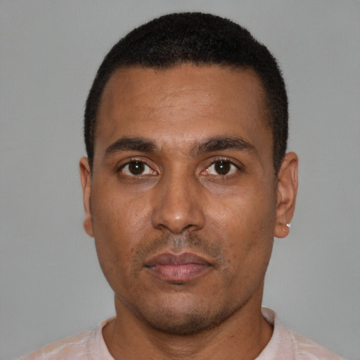 Neutral black young-adult male with short  black hair and brown eyes