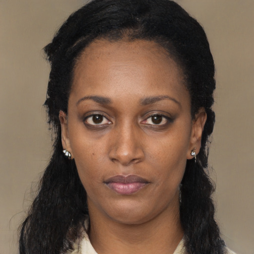 Neutral black young-adult female with long  black hair and brown eyes