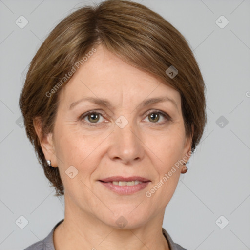 Joyful white adult female with medium  brown hair and grey eyes