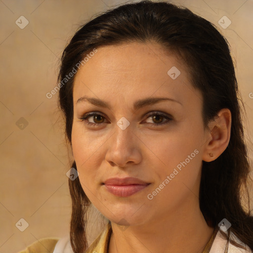 Joyful white young-adult female with long  brown hair and brown eyes