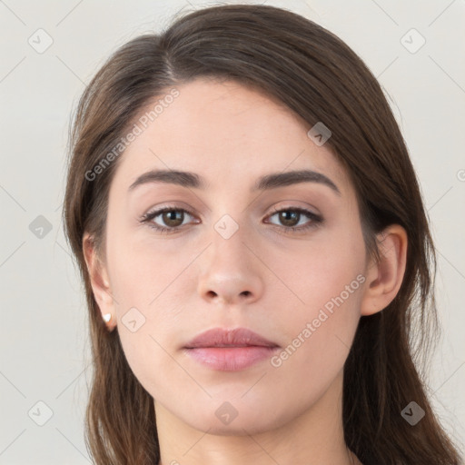 Neutral white young-adult female with long  brown hair and brown eyes