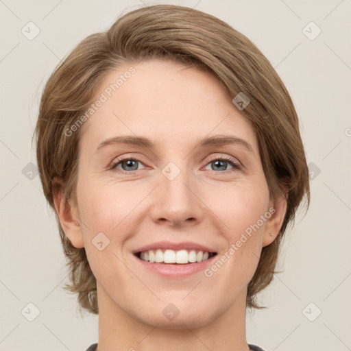 Joyful white young-adult female with medium  brown hair and green eyes