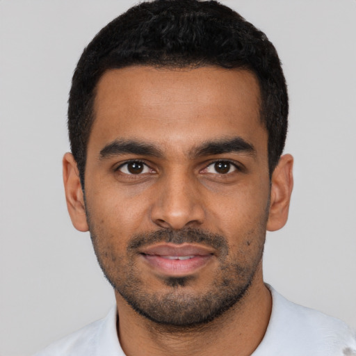 Neutral black young-adult male with short  black hair and brown eyes