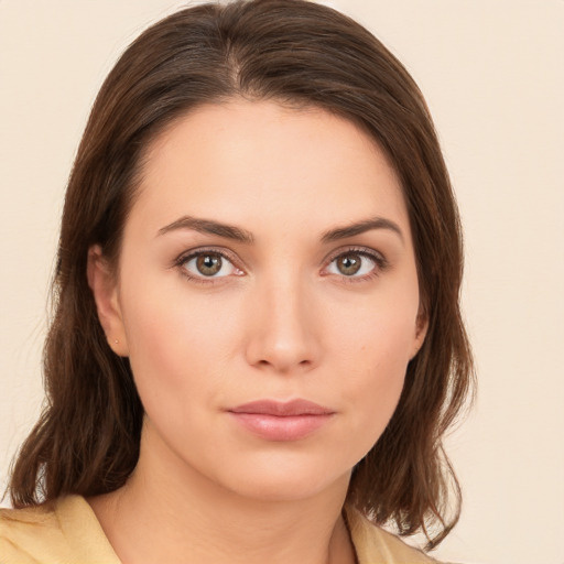 Neutral white young-adult female with medium  brown hair and brown eyes